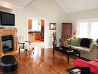 A tastefully furnished and sparklingly clean living room in a home served by Best Maids, top house cleaning service servicing Chicago and suburbs.